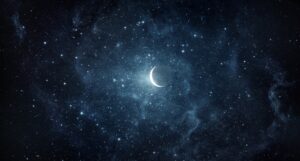 大宇宙を背景に輝く月